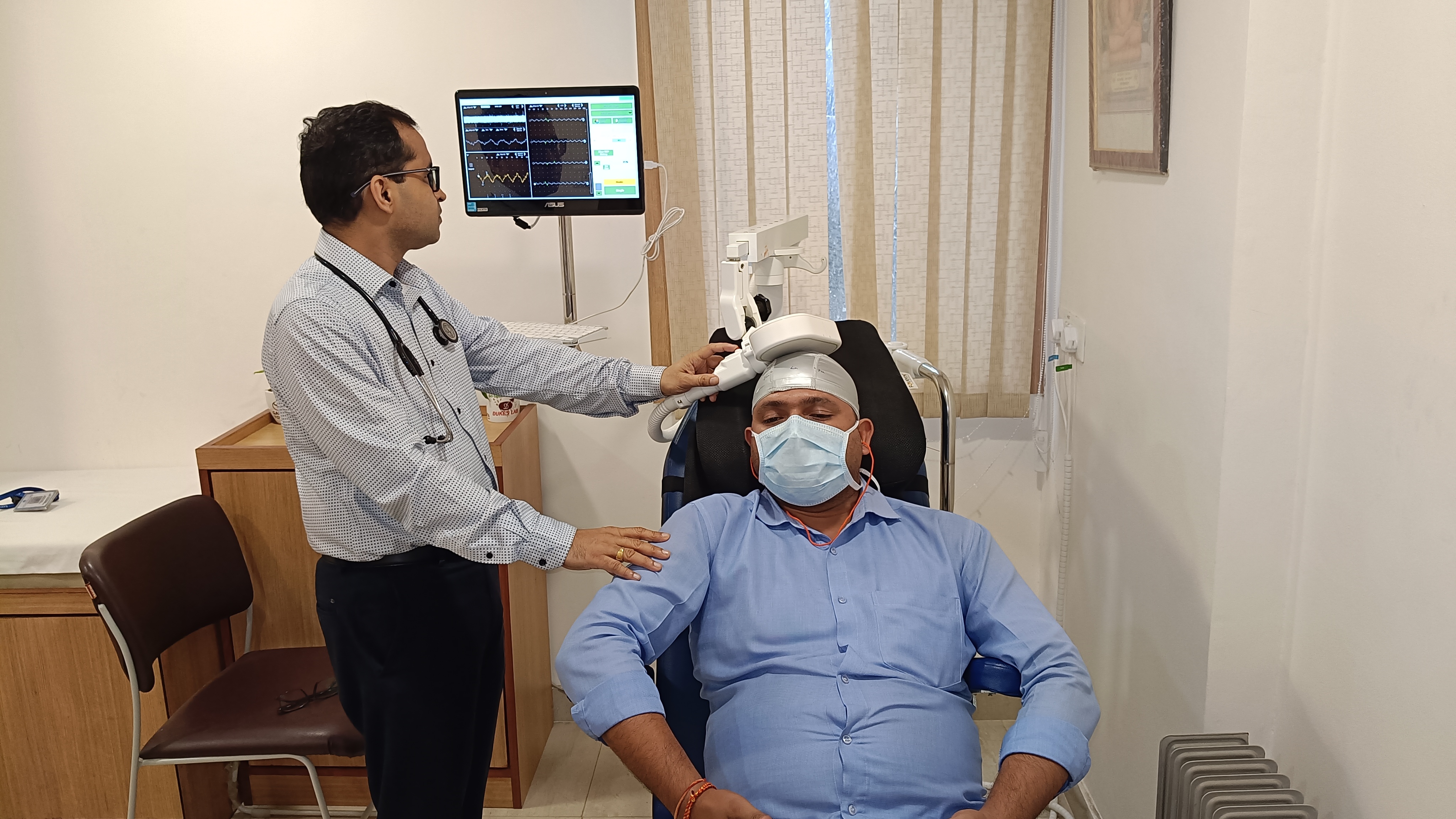 rTMS therapy session in progress